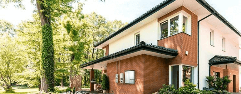Modern home with brick accents outside
